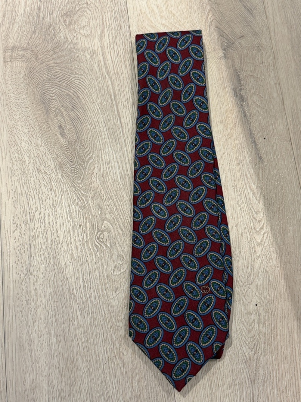 Gucci Burgundy Silk Tie with Blue and Green Medallions
